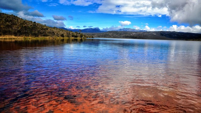 Enjoy Exotic Landscape of Habema Lake, The Highest Lake in Indonesia